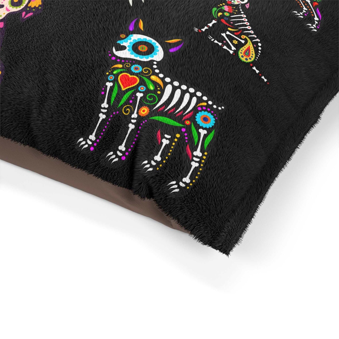 Dog bed with vibrant sugar skull design for pet comfort.