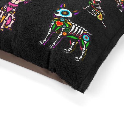 Colorful sugar skull design dog bed, cozy and vibrant pet accessory.