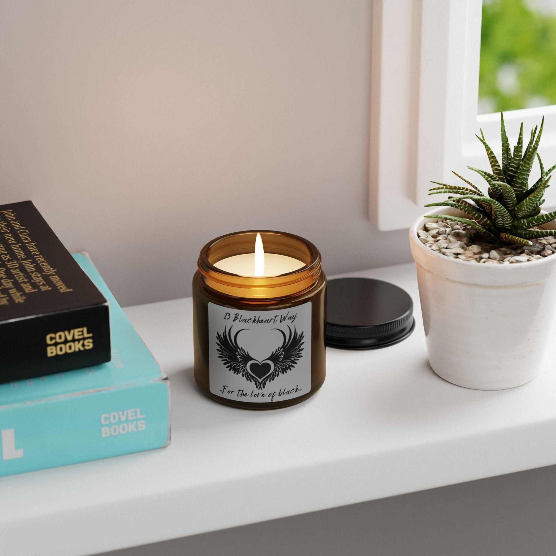 Eco-friendly soy candle in amber jar on windowsill, ideal for cozy ambiance.