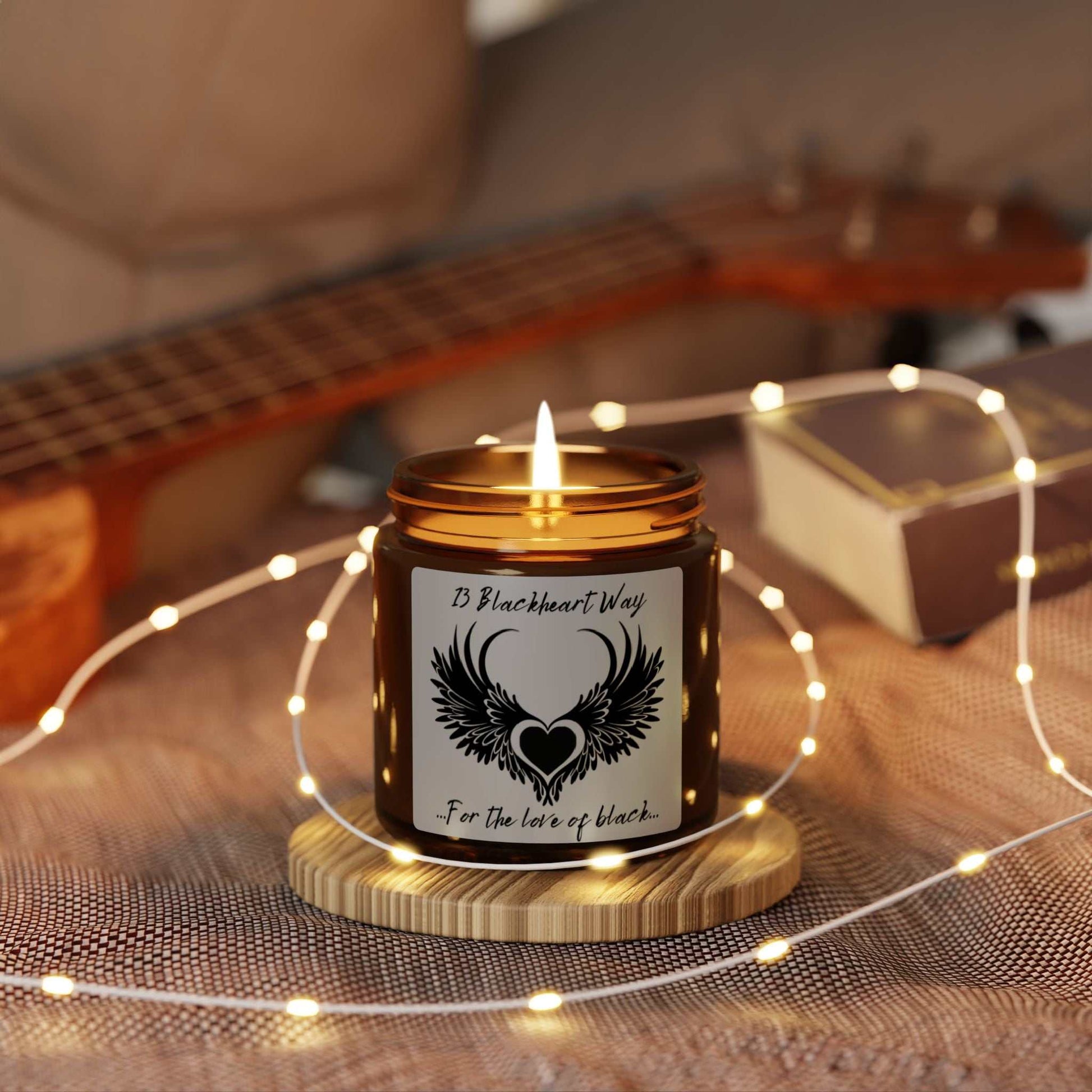 Soy candle in amber jar with warm glow, creating cozy ambiance.