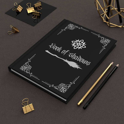 Hardcover journal with broom cover and decorative border for writing intentions and notes