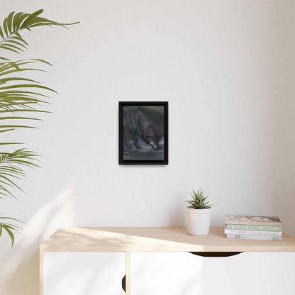 Framed wolf canvas art hanging on a minimalist wall with nature-inspired design.