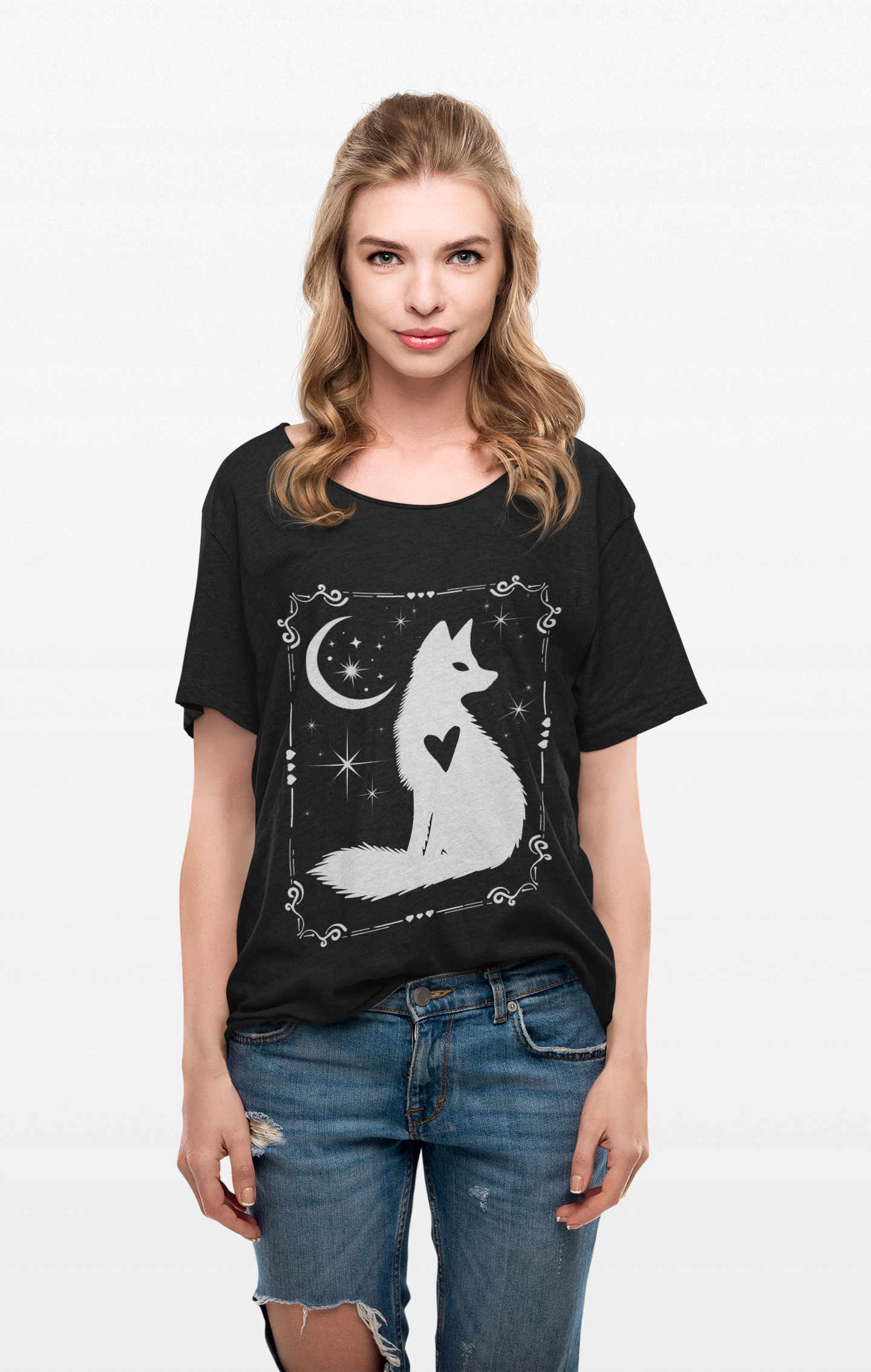 Woman wearing black Celestial Fox Tee with white fox, moon, and star design, paired with blue jeans
