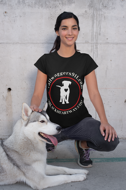 Unisex dog lover tee supporting animal rescue, black, worn by smiling person next to husky.
