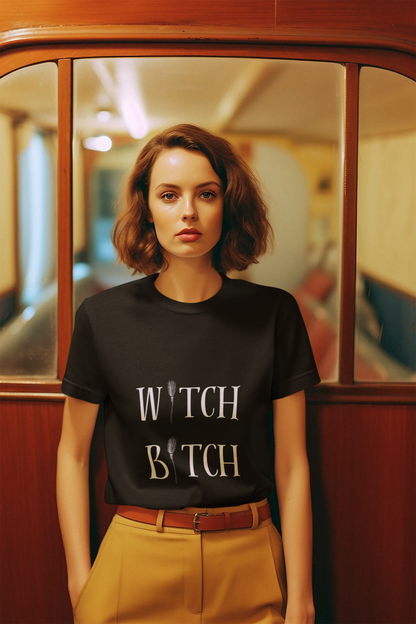 Unisex black jersey short sleeve tee with "Witch Bitch" text design, classic crew neck, and soft cotton fabric.