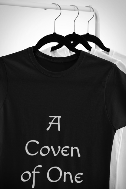 Black Witchy Unisex Tee black shirt with "A Coven of One" text on front, soft cotton mystical design