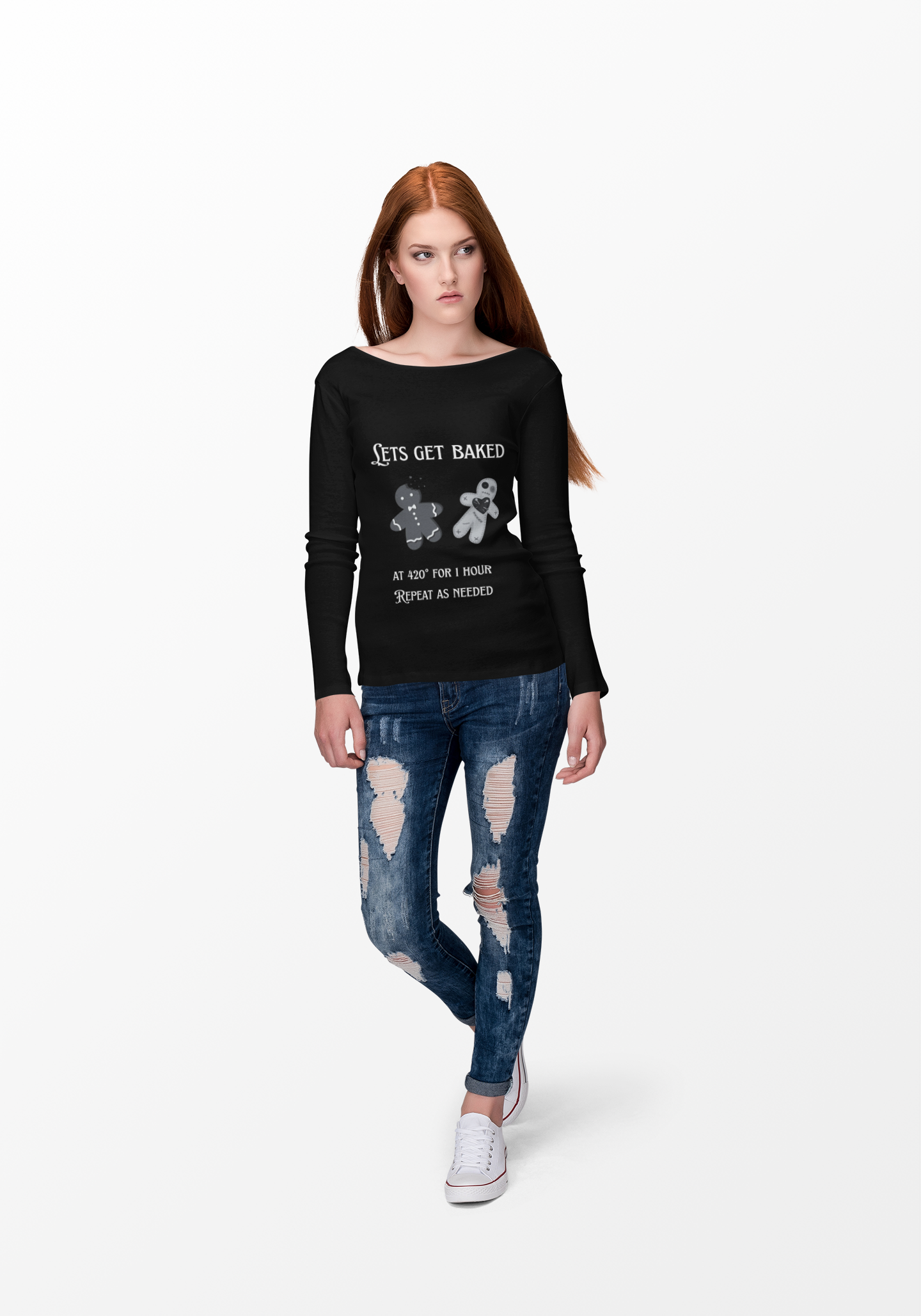 Woman wearing black Lets Get Baked Long Sleeve Tee with gingerbread design and text, paired with ripped blue jeans and white sneakers