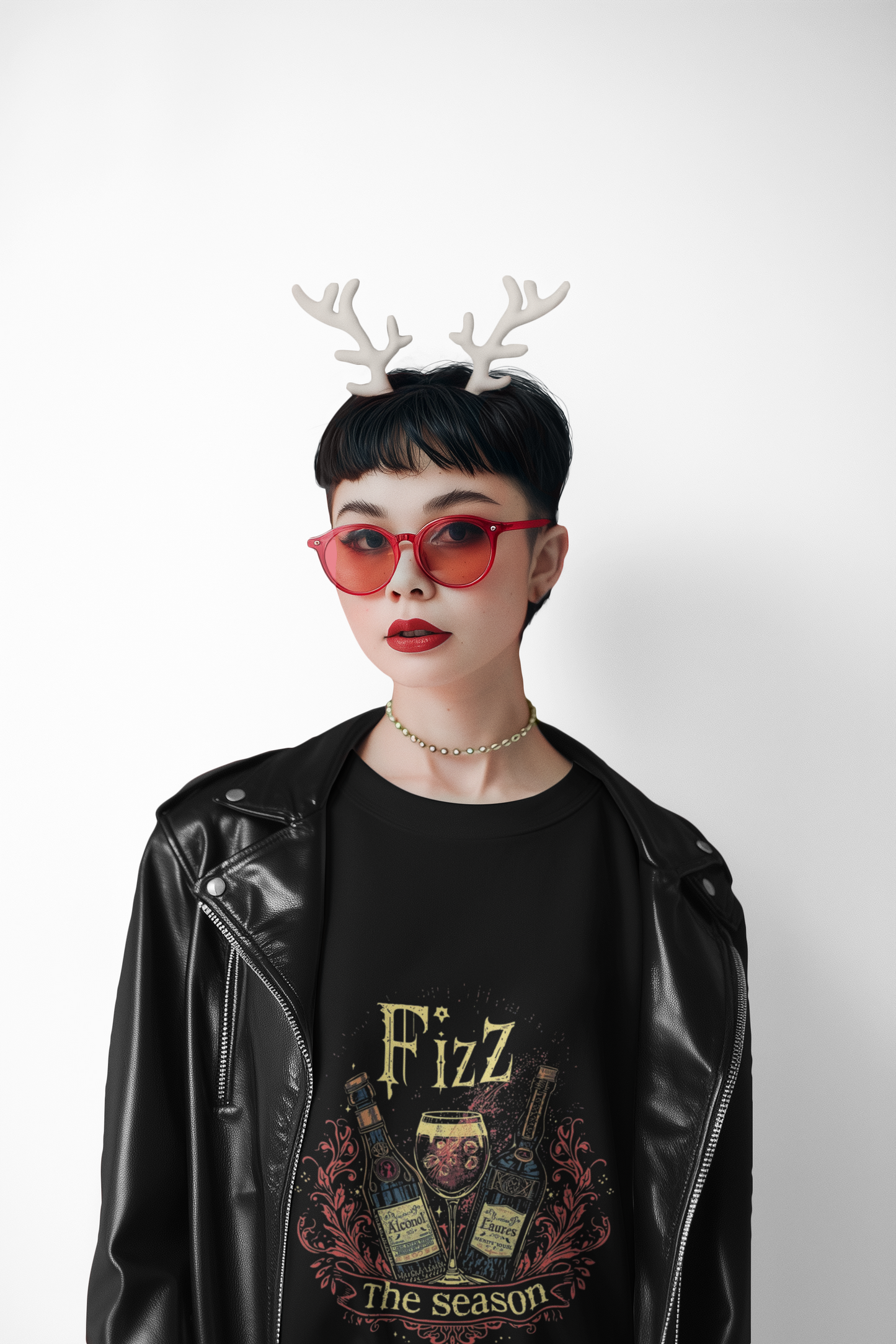 Woman wearing black "Fizz the Season" vintage ale holiday crewneck sweatshirt with reindeer antler headband and red sunglasses