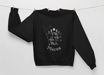 Black Ethereal Exile Pisces sweatshirt with silver-ink Pisces fish, moon phases, and constellation design, heavyweight cotton-poly blend with brushed fleece lining.