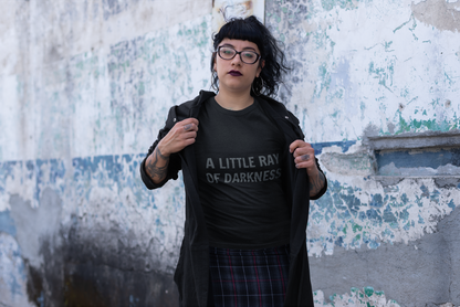Black t-shirt with "A Little Ray of Darkness" gothic font slogan, perfect for moody, dark fashion style