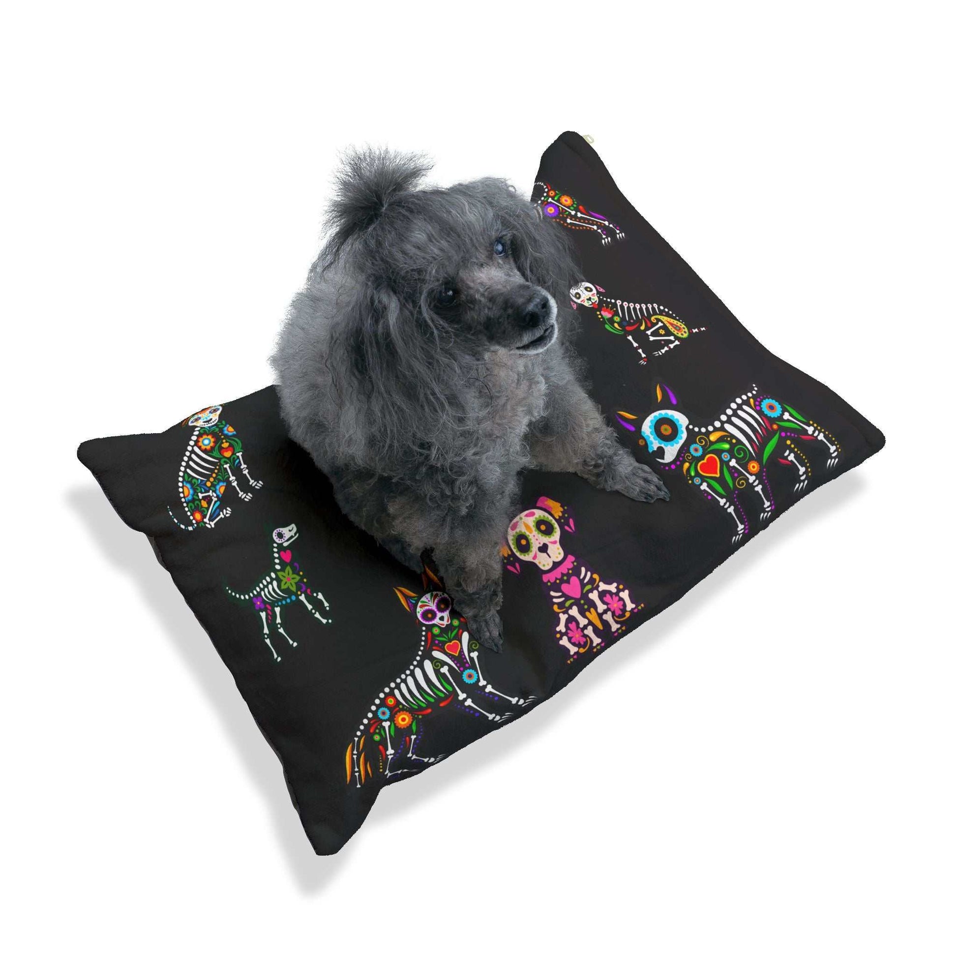 Dog bed with sugar skull design featuring vibrant, colorful patterns, providing comfort for pets.