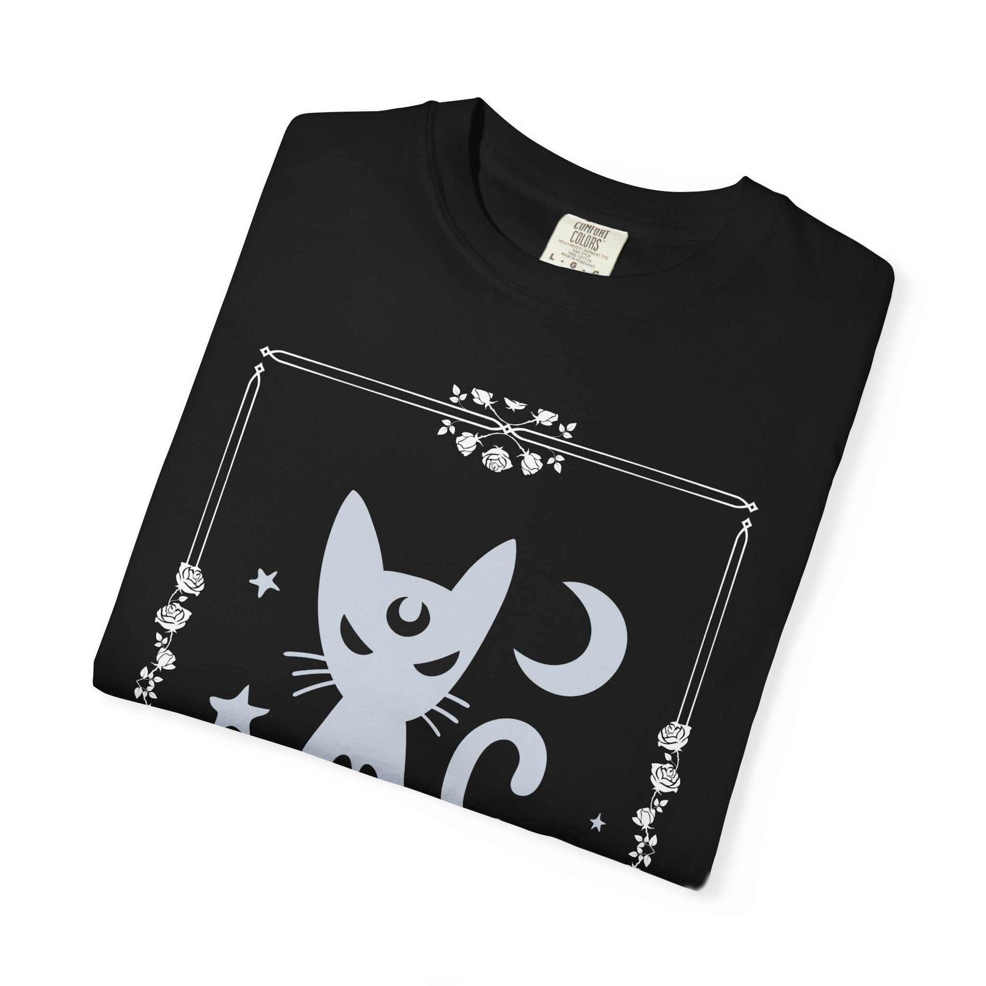 Black unisex t-shirt featuring a mystical witchy cat with a crescent moon and stars design.