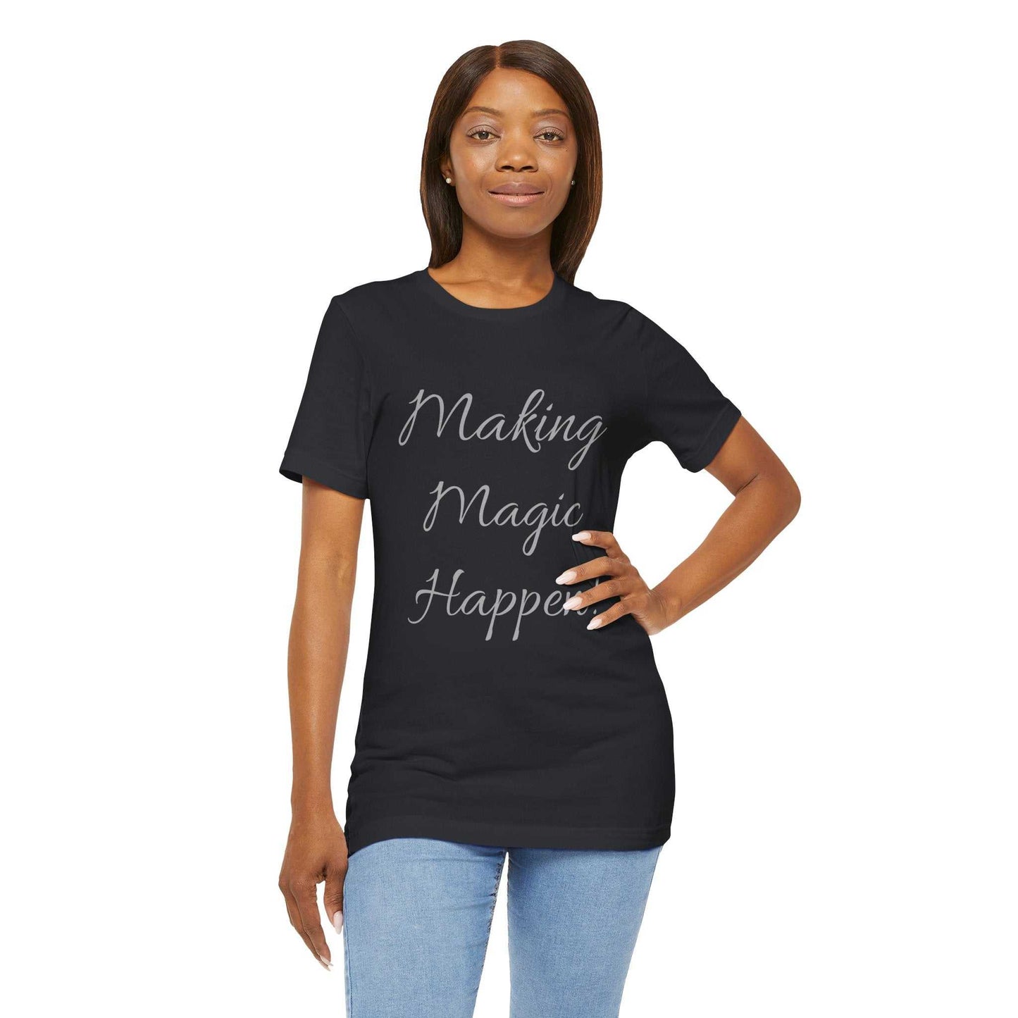 Black short sleeve tee with "Making Magic Happen" print, worn by a model.
