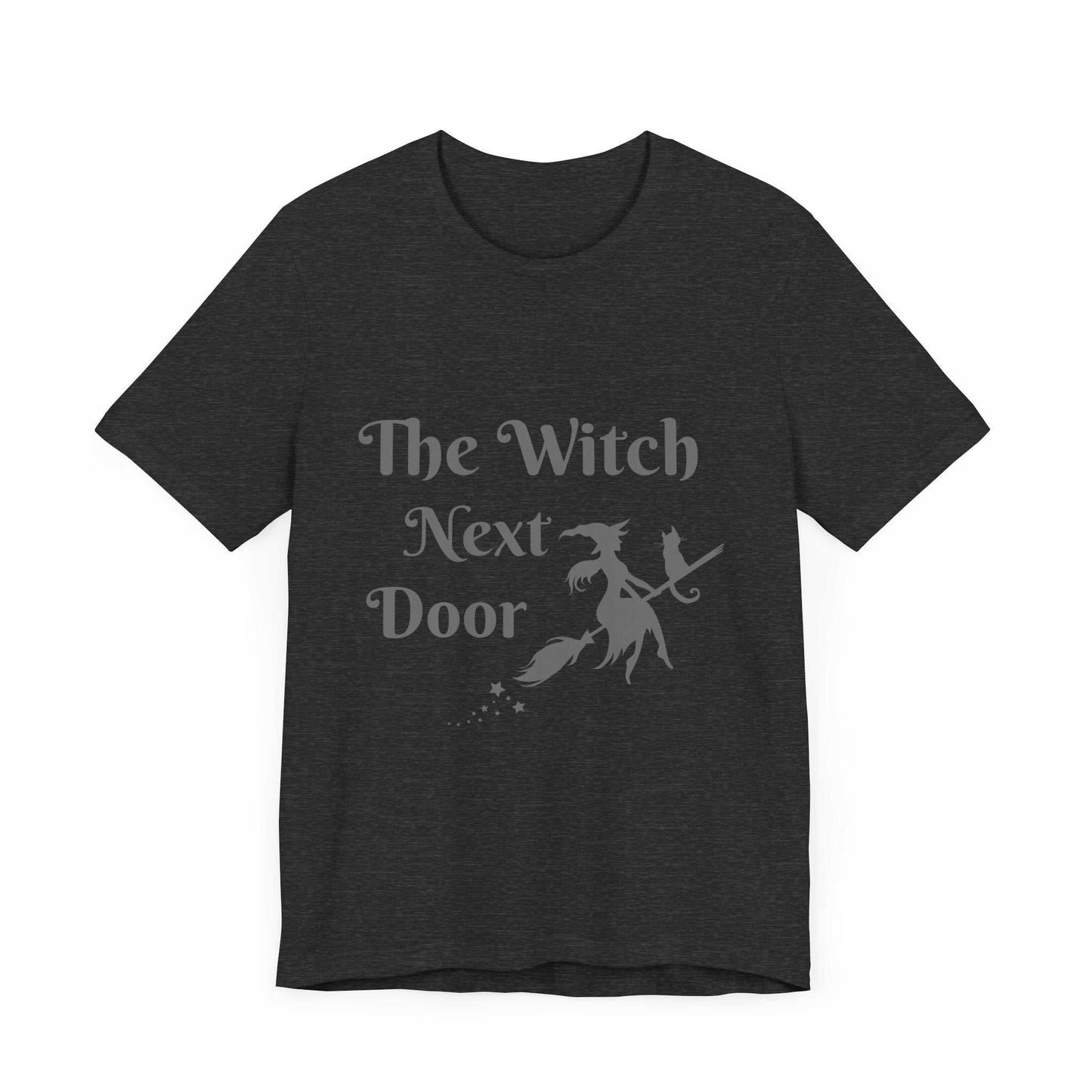 Unisex Jersey T-Shirt with "The Witch Next Door" design, perfect for Halloween and magic lovers.