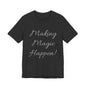 Black short sleeve tee with "Making Magic Happen!" message.