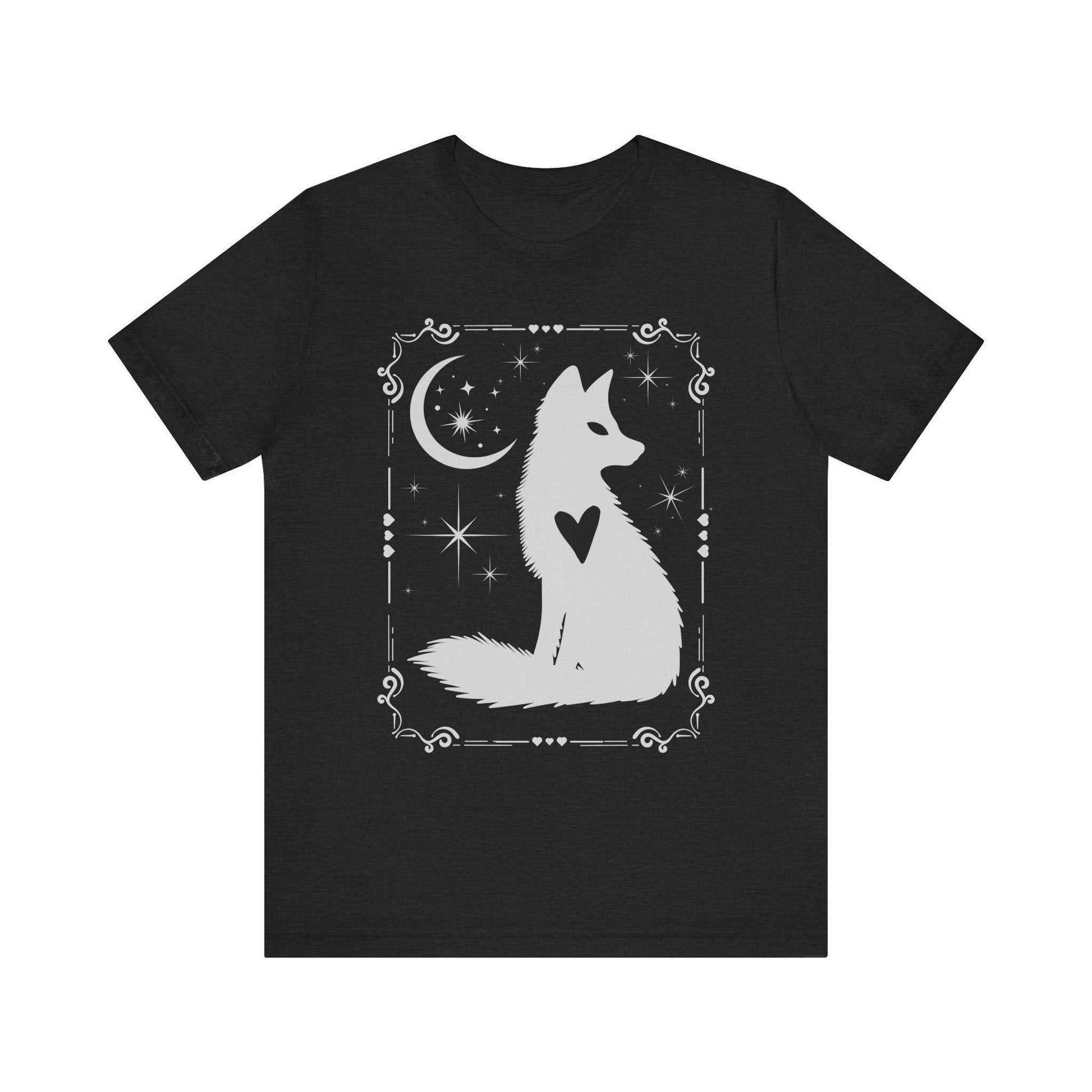Black short sleeve tee with a white celestial fox design featuring a heart, moon, and stars in bohemian style