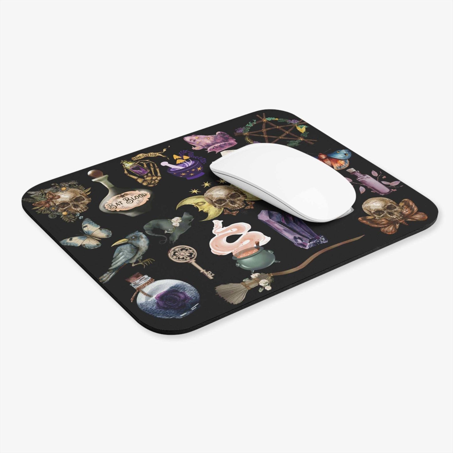 Gothic witchcraft mouse pad with skull and potion design for spooky aesthetics.