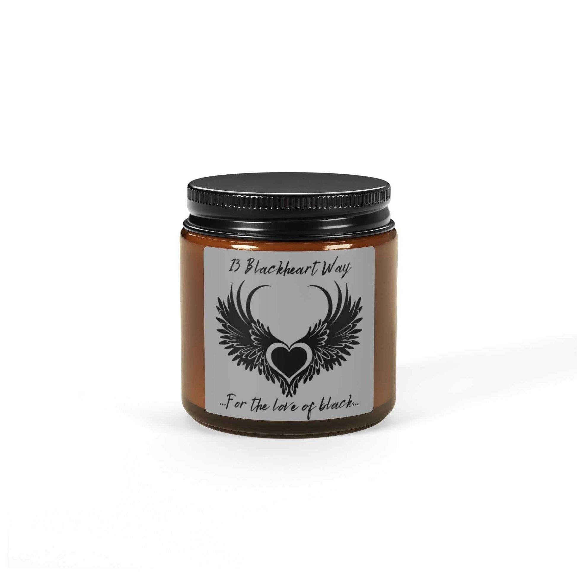 Soy candle in an amber jar with black lid, featuring eco-friendly and non-toxic blend, ideal for creating cozy ambiance.