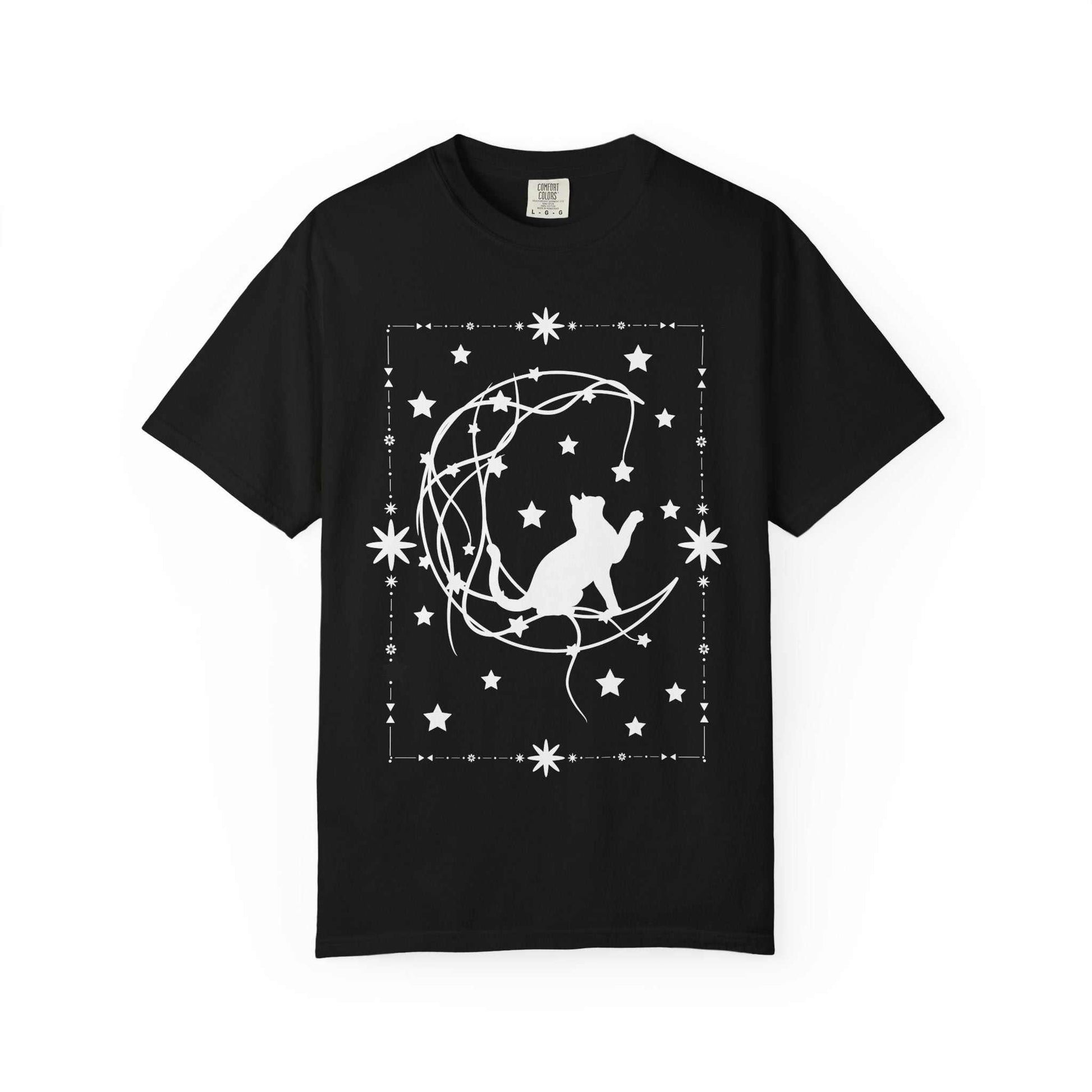 Black unisex t-shirt with celestial cat on crescent moon and stars design